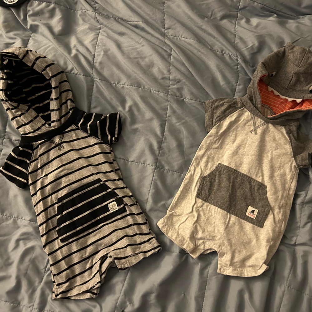 2  Carter’s Rompers. 9 Months.